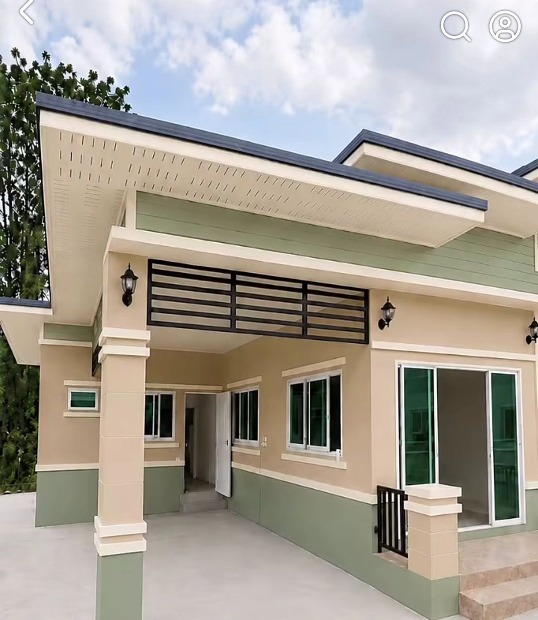 Sage and cream residential exterior with coordinated trim